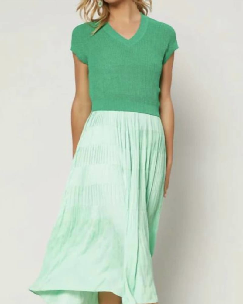 Front of a model wearing a size L Cami Dress Sweater Set W/ Pleats On Skirt in Green in Green by current air. | dia_product_style_image_id:335089
